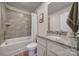 Bathroom with granite countertop and tiled shower/tub at 179 Tanner Loop, Troutman, NC 28166