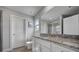 Bathroom with granite countertop and walk-in shower at 179 Tanner Loop, Troutman, NC 28166