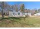 Charming single-story home with gray siding, black shutters and front yard at 1805 Drew Dr, Lincolnton, NC 28092