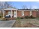 Brick home with a covered porch and landscaping at 234 Robinson St, Rock Hill, SC 29730