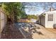 Backyard with shed, deck, and gravel area at 2601 Columbus Cir, Charlotte, NC 28208