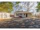 Backyard view showing shed and home exterior at 2601 Columbus Cir, Charlotte, NC 28208