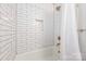 Updated bathroom with subway tile shower and white accents at 2601 Columbus Cir, Charlotte, NC 28208