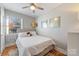 Bright bedroom featuring a full-size bed and hardwood floors at 2601 Columbus Cir, Charlotte, NC 28208