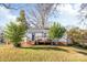 Ranch home with deck and landscaped yard at 2601 Columbus Cir, Charlotte, NC 28208