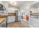 Updated kitchen with stainless steel appliances and butcher block counters at 2601 Columbus Cir, Charlotte, NC 28208