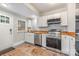 Updated kitchen featuring butcher block countertops and new appliances at 2601 Columbus Cir, Charlotte, NC 28208