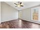 Spacious bedroom with hardwood floors and large windows offering natural light at 34466 Lisa Dr, Albemarle, NC 28001