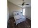 Cozy bedroom with wood floors and a ceiling fan at 34466 Lisa Dr, Albemarle, NC 28001