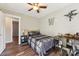 Bedroom with ceiling fan, hardwood floors and window at 34466 Lisa Dr, Albemarle, NC 28001