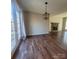 Bright dining room with hardwood floors and access to a deck at 34466 Lisa Dr, Albemarle, NC 28001