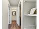 Hallway with bathroom and linen closet access at 34466 Lisa Dr, Albemarle, NC 28001