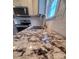 Close-up of granite countertop with double sink at 34466 Lisa Dr, Albemarle, NC 28001