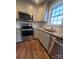 Modern kitchen with stainless steel appliances and granite countertops at 34466 Lisa Dr, Albemarle, NC 28001