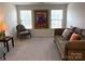 Comfortable bedroom with neutral decor and plush carpet at 3628 Benseval Ln, Matthews, NC 28104