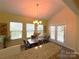 Bright dining area with hardwood floors and access to backyard patio at 3628 Benseval Ln, Matthews, NC 28104