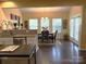 Kitchen boasts granite countertops, stainless steel appliances, and breakfast area at 3628 Benseval Ln, Matthews, NC 28104