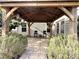 Relaxing pergola patio with seating and lush greenery at 3628 Benseval Ln, Matthews, NC 28104