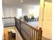 Upper hallway with a view of living area and staircase at 3628 Benseval Ln, Matthews, NC 28104