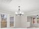 Elegant dining room with chandelier and hardwood floors at 4421 Gum St, Charlotte, NC 28208