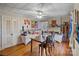 Bright dining room featuring hardwood floors and a ceiling fan at 447 Nc 16 S Hwy, Taylorsville, NC 28681