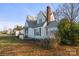 Side view of a charming house with mature landscaping at 447 Nc 16 S Hwy, Taylorsville, NC 28681