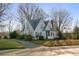 Two-story house with a gabled roof and driveway, situated on a spacious lot at 447 Nc 16 S Hwy, Taylorsville, NC 28681