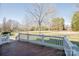 View from deck shows expansive backyard with trees at 5023 Ancestry Cir, Matthews, NC 28104