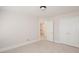 Spacious bedroom with carpet, double doors, and window at 5023 Ancestry Cir, Matthews, NC 28104