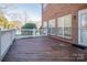 Spacious deck with white railings overlooks a large backyard at 5023 Ancestry Cir, Matthews, NC 28104