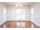 Bright dining room with hardwood floors and large windows at 5023 Ancestry Cir, Matthews, NC 28104