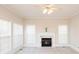 Spacious living room with fireplace, neutral decor, and hardwood floors at 5023 Ancestry Cir, Matthews, NC 28104