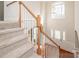 View of staircase from above, showing hardwood floors and entryway at 5023 Ancestry Cir, Matthews, NC 28104