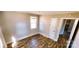 Bedroom with laminate flooring and a closet, adjacent to the kitchen at 5917 Peach St, Charlotte, NC 28269