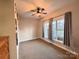 Simple bedroom with neutral decor and large windows at 6022 Candlestick Ln, Lancaster, SC 29720