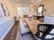 Elegant dining room featuring a large table and statement lighting at 6022 Candlestick Ln, Lancaster, SC 29720