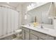 Clean bathroom with double vanity and shower/tub combo at 6142 Cloverdale Dr, Tega Cay, SC 29708