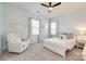 Light and airy bedroom with a ceiling fan, and plenty of natural light at 6142 Cloverdale Dr, Tega Cay, SC 29708