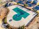 Aerial view of community pool with safety cover and surrounding landscape at 6142 Cloverdale Dr, Tega Cay, SC 29708