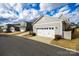 Detached garage with white door, offering ample parking at 6142 Cloverdale Dr, Tega Cay, SC 29708