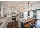 Modern kitchen with granite countertops, stainless steel appliances, and island at 6142 Cloverdale Dr, Tega Cay, SC 29708