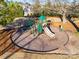 Community playground with playset, slide, and wood-chip surface at 6142 Cloverdale Dr, Tega Cay, SC 29708