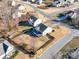 Aerial view of house, backyard, and surrounding neighborhood at 6608 Brookgreen Ter, Matthews, NC 28104