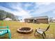 Relaxing backyard with firepit and patio area at 6751 Lackey Rd, Vale, NC 28168