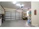 Attached garage with storage shelving and opener at 6751 Lackey Rd, Vale, NC 28168