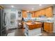 Kitchen with island, stainless steel appliances, and wood cabinets at 6751 Lackey Rd, Vale, NC 28168