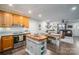 Kitchen with island, stainless steel appliances, and wood cabinets at 6751 Lackey Rd, Vale, NC 28168