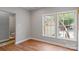 Bright, spacious bedroom featuring laminate floors and windows for lots of natural light at 7019 Walnut Ridge Ct, Charlotte, NC 28217