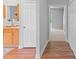 Bright hallway featuring hardwood floors and neutral paint at 7019 Walnut Ridge Ct, Charlotte, NC 28217