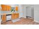 Kitchen with wood cabinets and laminate floors at 7019 Walnut Ridge Ct, Charlotte, NC 28217